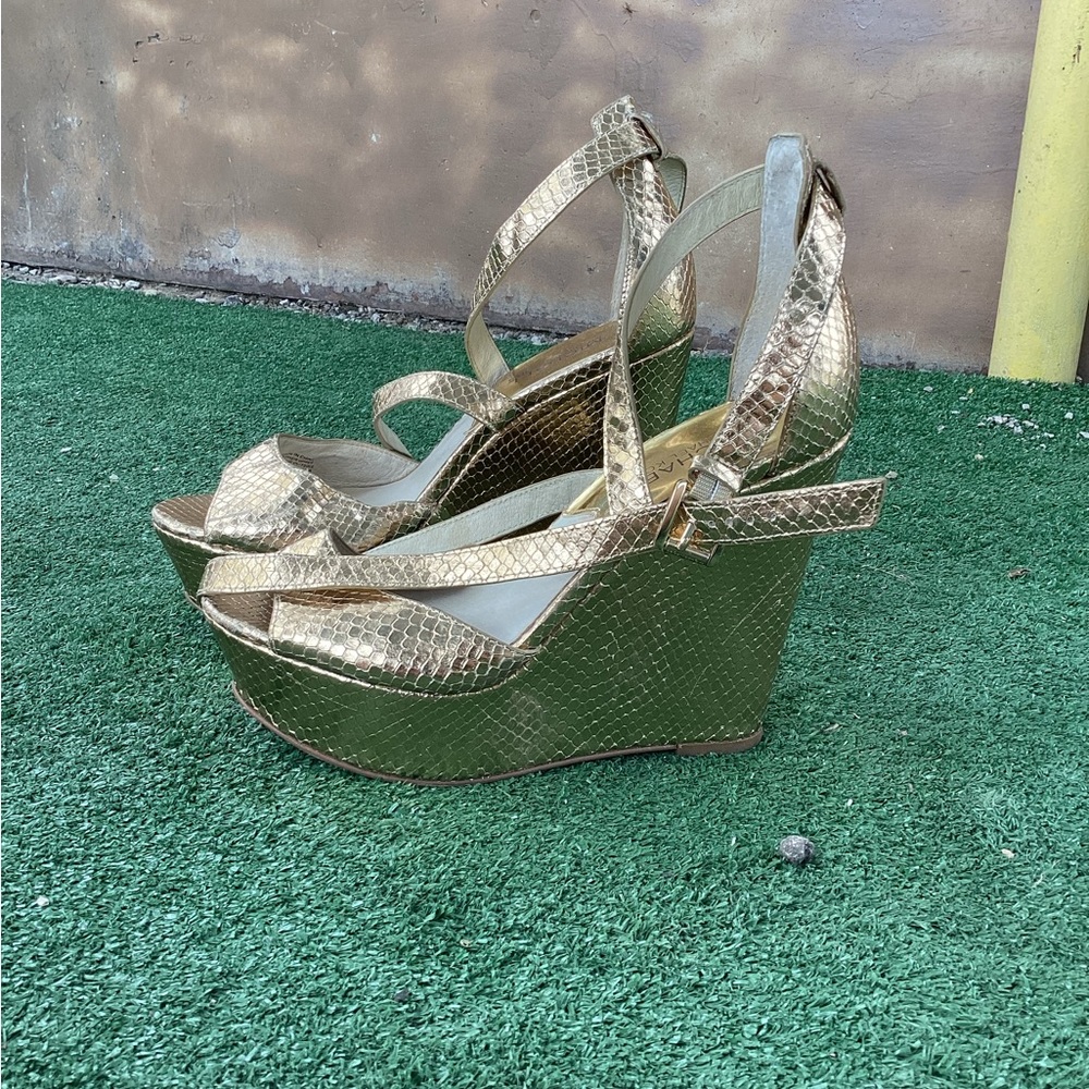Micheal Kors gold wedges. Sized at 7.5